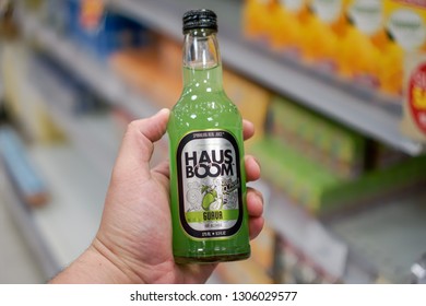 Melaka, Malaysia - Circa February, 2019: Man Holding The HAUS BOOM Sparkling Real Fruit Juice. Local Brand Which Recently Became Famous Over Conflict In Free Advertising By The Youth Minister Malaysia