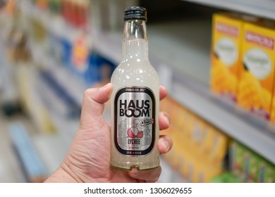 Melaka, Malaysia - Circa February, 2019: Man Holding The HAUS BOOM Sparkling Real Fruit Juice. Local Brand Which Recently Became Famous Over Conflict In Free Advertising By The Youth Minister Malaysia