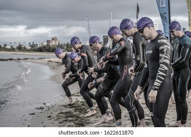 MELBOURNE, AUSTRALIA -12JANUARY, 2020: 2XU Triathlon Series, St Kilda, Melbourne 2020, Race 3, Artistic, desaturated image of the Men's Olympic Distance Race start.