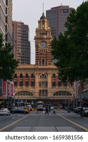 MELBOURNE, AUSTRALIA - 18 January 2020: The Elizabeth Street Tram Tracks Leading Towards The Flinders Street Station Clock Tower.