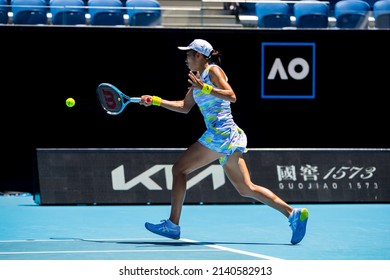 MELBOURNE, AUSTRALIA - 19 JANUARY, 2022: Australian Open Tennis Grand Slam. Day 3, Elise Mertens (BEL) won against Shuai Zhang (CHN). 6:2, 6:2.Forehand play from Shuai Zhang