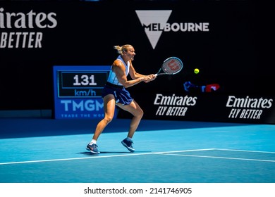 MELBOURNE, AUSTRALIA - 19 JANUARY, 2022: Australian Open Tennis Grand Slam. Day 3, Kaia Kanepi (EST) won against Maddison Inglis (AUS). 2:6, 6:2, 6:0. Kanepi putting it all into a backhand return.