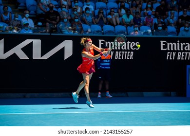 MELBOURNE, AUSTRALIA - 19 JANUARY, 2022: Australian Open Tennis Grand Slam. Day 3, Aryna Sabalenka (BLR) won against Marketa Vondrousova (CZE). 4:6, 6:3, 6:1. Sabalenka in the air with a backhand.