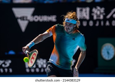 MELBOURNE, AUSTRALIA - 19 JANUARY, 2022: Australian Open Tennis Grand Slam. Day 3, Stefanos Tsitsipas (GRE) won against Benoit Paire (FRA). 6:3, 7:5, 6:7, 6:4. Tsitsipas backhand close up.