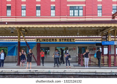 Melbourne, Australia - 21st February 2018: Passengers Waiting For Train, Platform, Flinders Street Station. This Is The Main Railway Station,