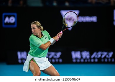 MELBOURNE, AUSTRALIA - 22 JANUARY, 2022: Australian Open Tennis Grand Slam. Day 6, Sorana Cirstea (ROM) won against Anastasia Pavlyuchenkova (RUS) 6:3, 2:6, 6:2 Pavlyuchenkova positioned to strike.