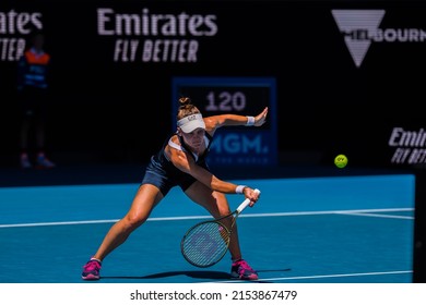 MELBOURNE, AUSTRALIA - 22 JANUARY, 2022: Australian Open Tennis. Day 6, Doubles: V. Kudermetova (RUS) and E. Mertens (BEL) won against Y. Xu and Z. Yang (CHN) 7:6, 6:4 Kudermetova picking up drop shot