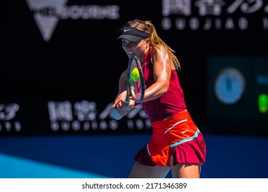 MELBOURNE, AUSTRALIA - 23 JANUARY, 2022: Australian Open Tennis Grand Slam. Day 6, Madison Keys (USA) won against Paula Badosa (ESP). 6:3, 6:1. Badosa flattens the ball with her racquet.