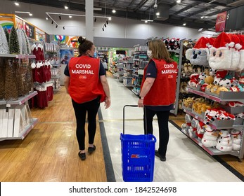 Melbourne, Australia - 28th October 2020: Covid Marshals At Melbourne Kmart Monitor Social Distancing With Long Lines After Retail Reopens During The Coronavirus COVID-19 Pandemic