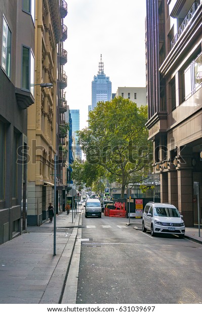 Melbourne, Australia -\
April 17, 2017: Little Collins Street with view of famous office\
skyscraper building on 120 Collins street, Investa commercial real\
estate company