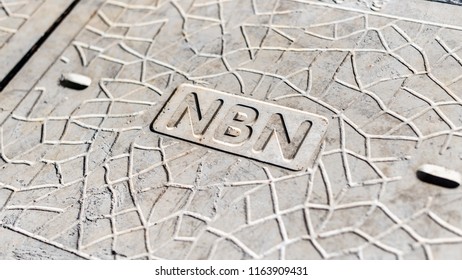 Melbourne, Australia - August 2, 2018: A Concrete Manhole Cover With The NBN Label And Pattern In The Concrete