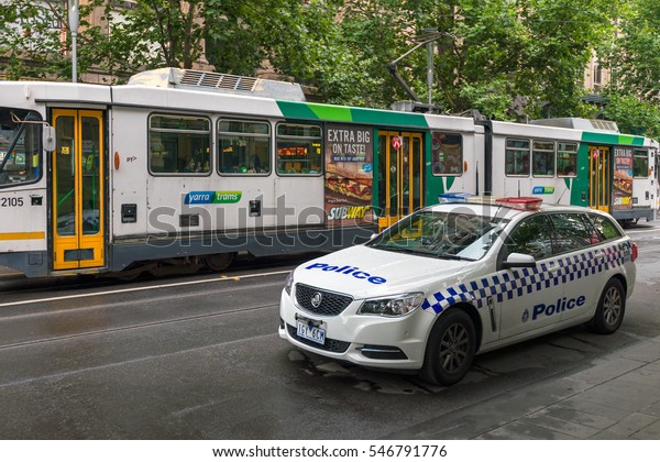 Melbourne, Australia - December\
27, 2016: Holden police car parked in Melbourne CBD area. Victoria\
Police provides a 24-hour service to the Victorian\
community