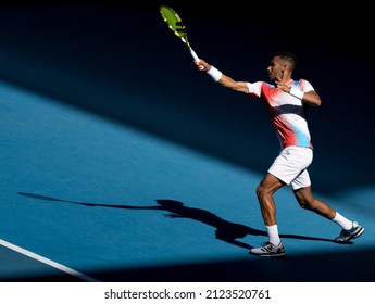 MELBOURNE, AUSTRALIA - Jan 24, 2022: A Closeup Of Felix Auger Aliassime, Hitting A Forehand Out Of The Shadows  2022 Australian Open 