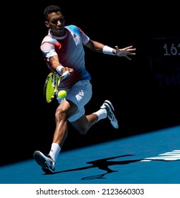 MELBOURNE, AUSTRALIA - Jan 24, 2022: A Vertical Shot Of Felix Auger Aliassime Hitting A Forehand On The Run  2022 Australian Open 