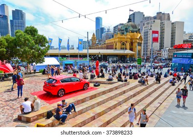 Melbourne, Australia - January 18 : People Visiting Federation Square In Melbourne City Cetre On January 18, 2015. The Square Is A Public Space Created In 2002 In The Heart Of Melbourne. 