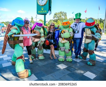 MELBOURNE, AUSTRALIA - JANUARY 23, 2016: Australian tennis fans taken pictures with Teenage Mutant Ninja Turtles during 2016 Australian Open at Australian tennis center in Melbourne Park
