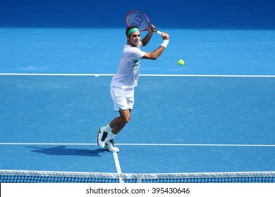 MELBOURNE, AUSTRALIA - JANUARY 26, 2016: Seventeen times Grand Slam champion Roger Federer of Switzerland in action during quarterfinal match at Australian Open 2016 in Melbourne Park