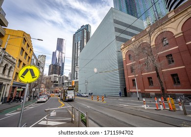 Melbourne, Australia - Jul 28, 2019: Tram Tracks Along The Swanston Street With RMIT Design Hub Building On The Right