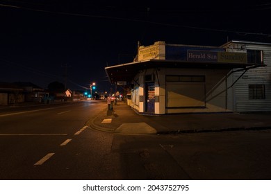 Melbourne, Australia - July 06, 2017:  Night Image Of An Old Suburban Corner Milk Bar And Convenience Store In Footscray, Melbourne, Australia.