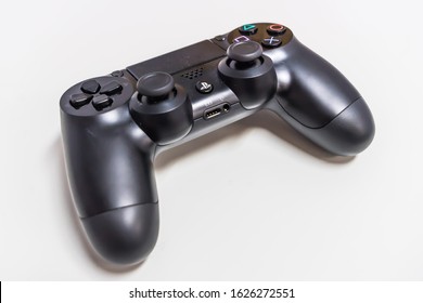 Melbourne, Australia - Jun 22, 2015: PlayStation 4 Gaming Controller On A White Table