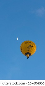 Melbourne, Australia - June 18, 2017: Yellow Tail Wine Brand Hot Air Balloon In The Sky With Moon Crescent. Yellow Tail Is An Australian Brand Of Wine Produced By Casella Family Brands 