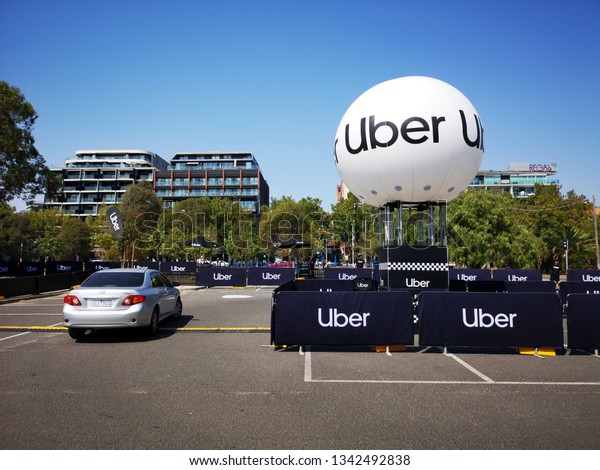 Melbourne, Australia: March 17, 2019: Uber car park at\
an event providing fast and easy transportation for local people.\
Uber is a crowdsourced taxi network company headquartered in\
California. 