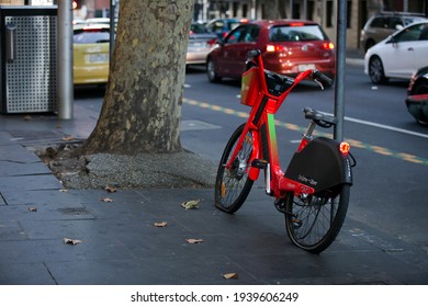 Melbourne, Australia - March 17, 2021:  A Gig Worker's Broken Electric Bike, Abandoned In A Street In Melbourne, Australia.  Flat Tyres And A Broken Chain.