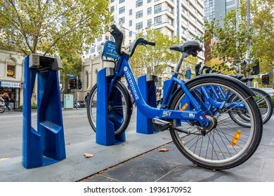 Melbourne, Australia - May 13, 2019: Bicycle Sharing Station Along Swanston Street. Resource Sustainable And Environmental Friendly City Quick Transport Option. In The Central Business District (CBD).