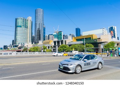 Melbourne, Australia - November 30, 2018: View Of A Taxi In Melbourne CBD With Crown Casino And Entertainment Complex In The Background.