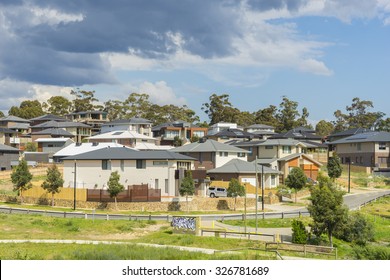 Melbourne, Australia - October 11, 2015: Row Of New, Modern Suburban Houses On The Hill In Melbourne With Trees During Daytime. 