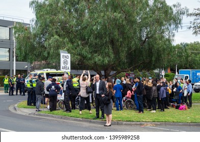 Melbourne, Australia - October 2, 2018: Staff and patients evacuated from Epworth Hawthorn private hospital, sheltering in St James Park.