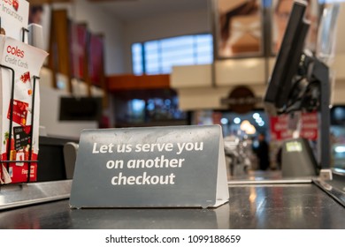 Melbourne, Australia-May 22, 2018: No Coles Staff Serve At Checkout Counter, Sign Displayed At The Conveyor Belt.
