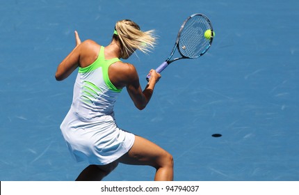 MELBOURNE - JANUARY 17: Maria Sharapova of Russia in her first round win over Gisela Dulko of Argentina the 2012 Australian Open on January 17, 2012 in Melbourne, Australia.