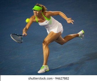 MELBOURNE - JANUARY 28: Victoria Azarenka of Belarus in her championship win over Maria Sharapova of Russia at the 2012 Australian Open on January 28, 2012 in Melbourne, Australia.