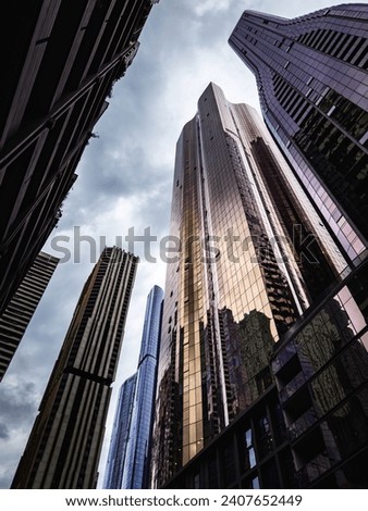 Melbourne skyscrapers, towering cityscape, urban high-rises, city skyline. Architecture. Australia.