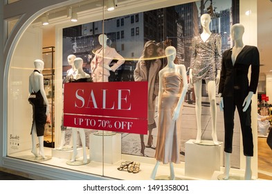 Melbourne, VIC/Australia-August 22nd 2019:  The Window Display Of A Women’s Fashion & Clothes Shop With A Large ‘Sales’ Decal.