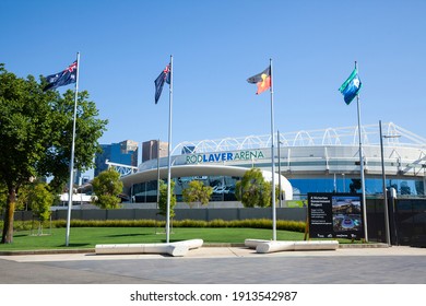 Melbourne, Victoria, Australia - 02.10.2021: Flags wave in the breeze outside Rod Laver Arena at Melbourne Park during the Australian Open Tennis Grand Slam.