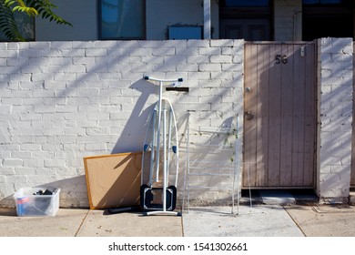 Melbourne, Victoria / Australia - 03/13/2018: Hard Rubbish Waiting To Be Collected On The Footpath Outside A House