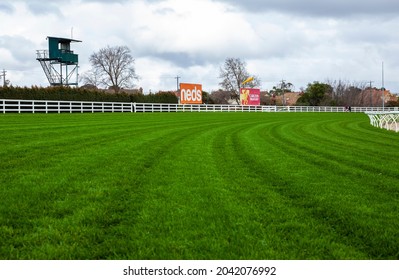 Melbourne, Victoria, Australia - 09.15.2021: Barriers, Judge's Tower, Billboards And The Lush Green Grass At Caulfield Racecourse, A Famous Horse Racing Track In Melbourne. Home Of The Caulfield Cup.