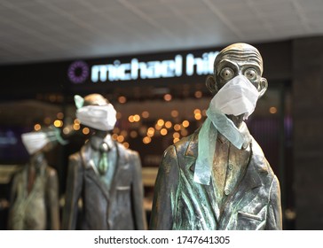 Melbourne, Victoria / Australia  - 20.02.20: Statue Of Office Workers Wearing Masks Due To Coronavirus, Protection From Virus