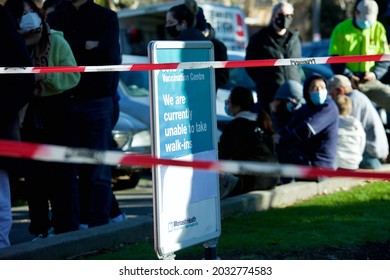 Melbourne, Victoria, Australia, August 30 2021: Covid Vaccination Sign. Queues Of People Waiting To Get Coronavirus Vaccine Outside Peanut Farm St Kilda Walk-in Covid-19 Vaccination Clinic. 