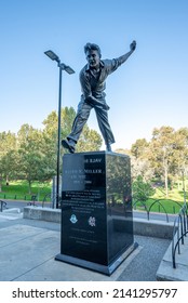 Melbourne, Victoria, Australia - December, 2021: Statue of legendary Australian cricketer Keith Miller outside the iconic Melbourne Cricket Ground (MCG).