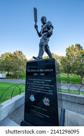 Melbourne, Victoria, Australia - December, 2021: Statue of legendary Australian cricketer Sir Donald Bradman outside the iconic Melbourne Cricket Ground (MCG). 