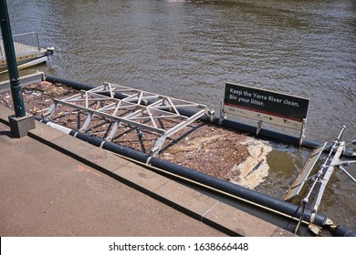 Melbourne, Victoria / Australia - January 26 2020: Rubbish collection barge on the Yarra Rive, Melbourne