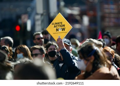 Melbourne, Victoria, Australia, July 30 2022: Climate Action Now Signs At Climate Change Protest - Young People And Students Rallying And Protesting Against Global Warming To Protect Planet Earth.