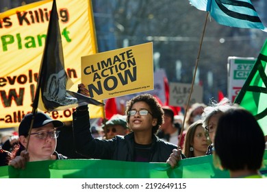 Melbourne, Victoria, Australia, July 30 2022: Climate Action Now Signs At Climate Change Protest - Young People And Students Rallying And Protesting Against Global Warming To Protect Planet Earth.