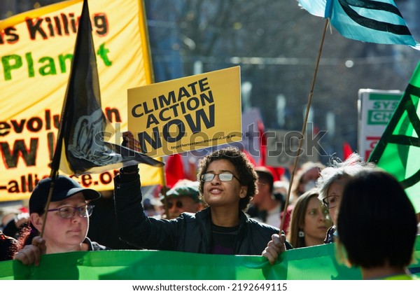 Melbourne, Victoria, Australia, July 30 2022:\
Climate Action Now signs at climate change protest - young people\
and students rallying and protesting against global warming to\
protect planet\
earth.