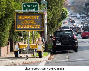 Melbourne, Victoria, Australia, June 11, 2021: Support Local Business Written On A Sign In Toorak Village To Encourage People To Support Struggling Small Businesses Affected By The Covid-19 Lockdown