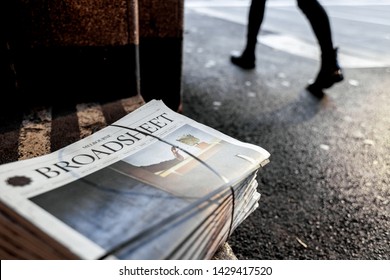 Melbourne, Victoria / Australia - June 20 2019: Broadsheet Newspaper Morning Street Doorstep Walking To Work