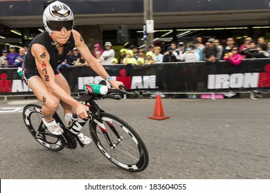 MELBOURNE, VICTORIA, AUSTRALIA - MARCH 23, 2014 - Mary Beth Ellis of USA during the 180km Ironman bike leg on March 23, 2014.